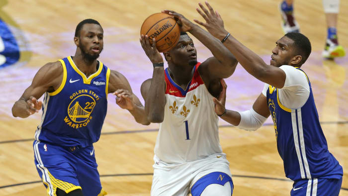 Zion Williamson drives to the hoop against the Warriors